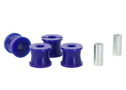Close-up of SuperPro high-performance polyurethane bushings for rear sway bar links.