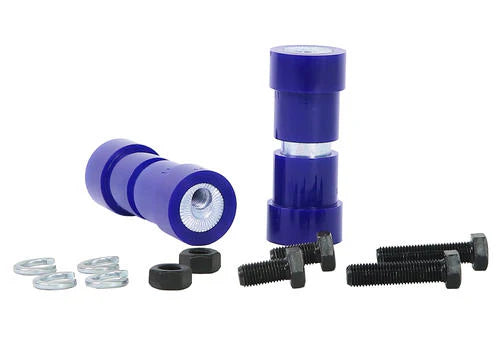 SuperPro SPF1811K camber‑adjustable bushings installed in front upper control arm of a Nissan Skyline.
