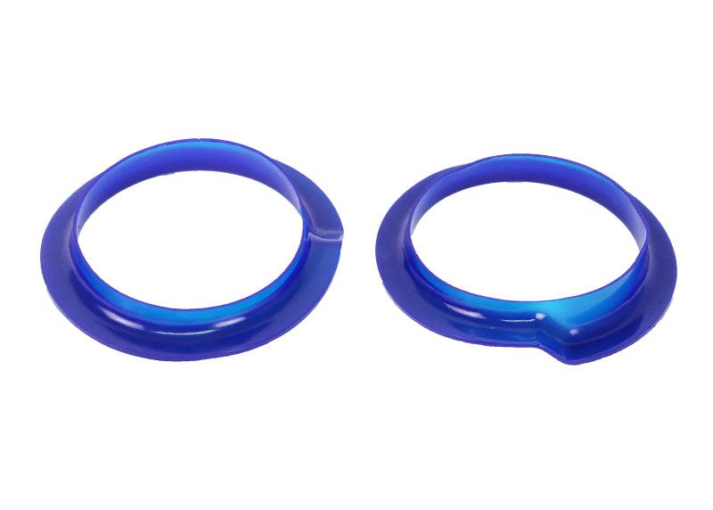 SuperPro SPF3247K polyurethane spring seat bushings installed in a Chevrolet Camaro rear suspension.