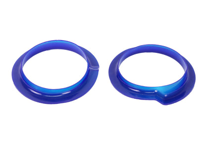 SuperPro SPF3247K polyurethane spring seat bushings installed in a Chevrolet Camaro rear suspension.