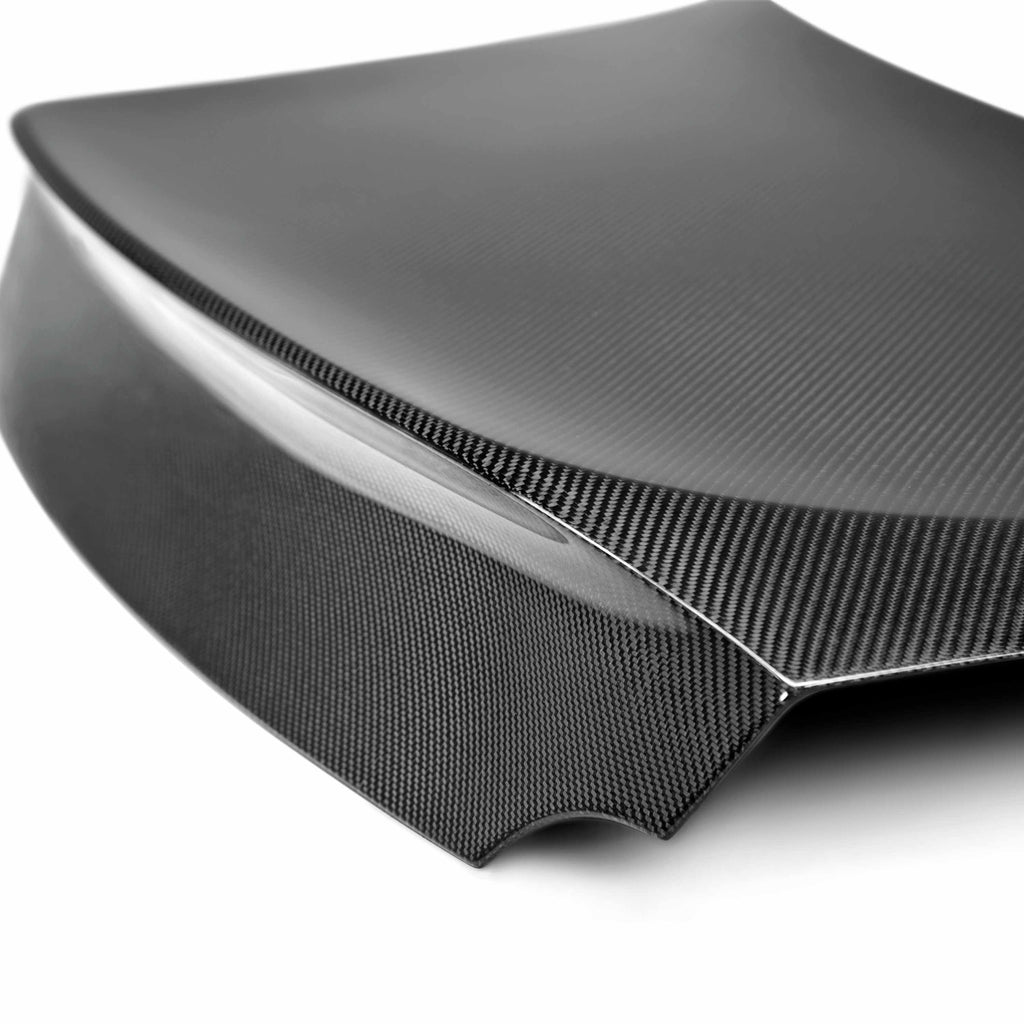 Overhead shot of the Seibon C-Style Carbon Fiber Trunk Lid on a GT-R, showcasing its seamless fitment and sporty design.