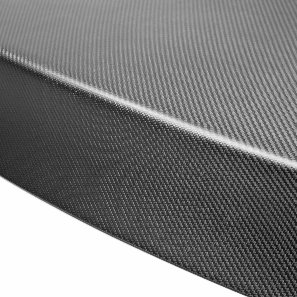 Close-up of the dry carbon fiber weave on the Seibon OEM-Style Trunk Lid, highlighting its premium lightweight construction.