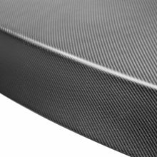 Load image into Gallery viewer, Close-up of the dry carbon fiber weave on the Seibon OEM-Style Trunk Lid, highlighting its premium lightweight construction.