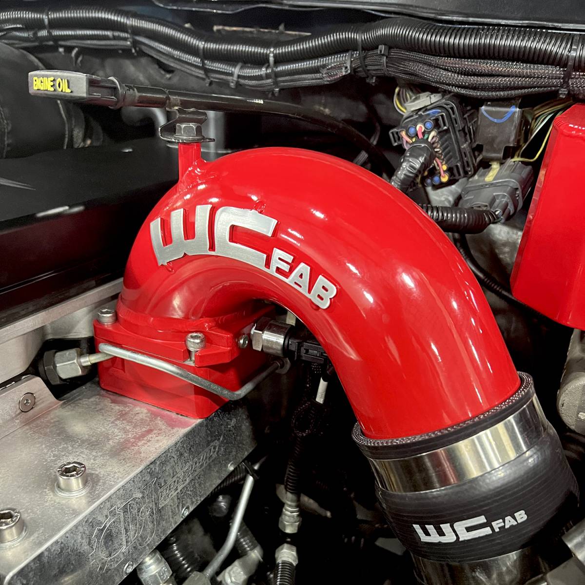 Wehrli WCF100329-CT 5.9 Cummins stage 1 intake bundle gloss white intercooler pipes installed on ram truck