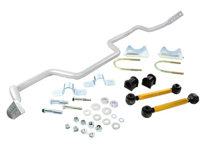 Automotive suspension components including a sway bar and bushings on a white background