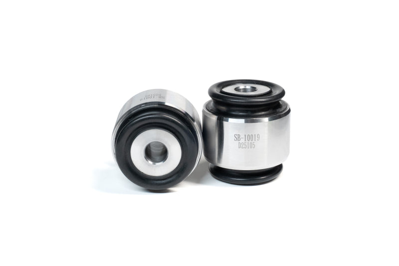 Two metal bushings on a white background