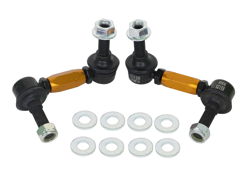 Two metal suspension links with gold accents and washers on a white background