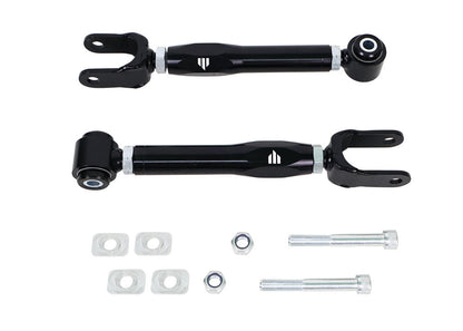 Two black metal control arms with mounting hardware on a white background