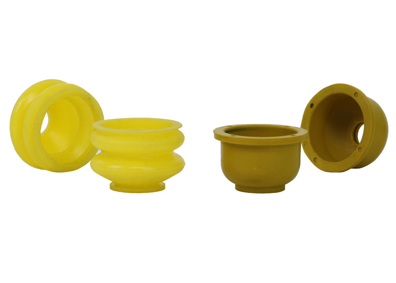 Yellow rubber bushings on a white background