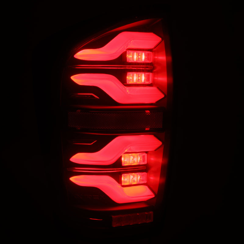 AlphaRex 16-21 Toyota TacomaLUXX LED Taillights Blk w/Activ Light/Seq Signal - eliteracefab.com