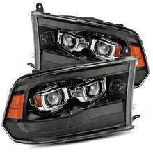 Load image into Gallery viewer, AlphaRex 09-18 Ram 1500HD LUXX Proj Headlight Plnk Style Jet Blk w/Activ Light/Seq Signal/Smoked DRL - eliteracefab.com