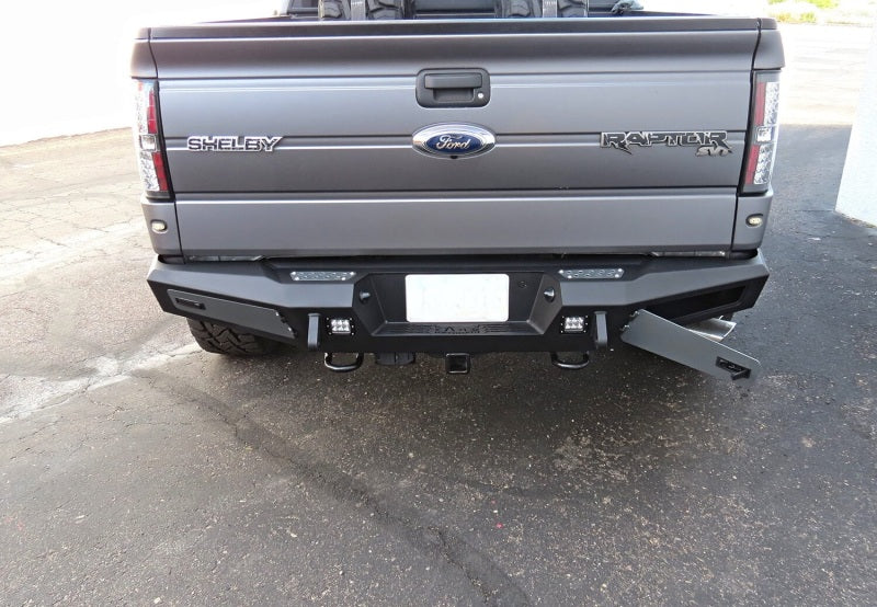 Addictive Desert Designs 10-14 Ford F-150 Raptor HoneyBadger Rear Bumper w/ Tow Hooks - eliteracefab.com