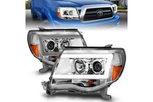 Load image into Gallery viewer, ANZO 2005-2011 Toyota Tacoma Projector Headlights w/ Light Bar Chrome Housing - eliteracefab.com