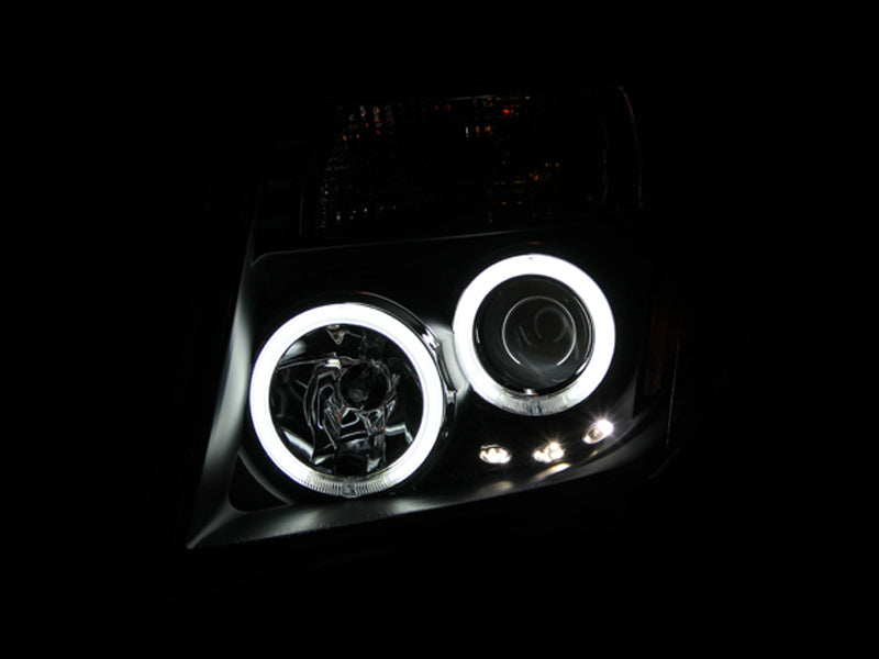 ANZO USA Nissan Frontier Projector Headlights W/ Halo Black; 2005-2008 - eliteracefab.com