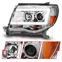 Load image into Gallery viewer, ANZO 2005-2011 Toyota Tacoma Projector Headlights w/ Light Bar Chrome Housing - eliteracefab.com