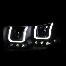 Load image into Gallery viewer, ANZO USA Dodge Ram 1500 / 2500 / 3500 Projector Headlights W/ U-Bar Black; 2006-2008 - eliteracefab.com