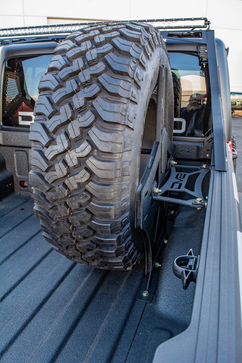 DV8 Offroad 2019+ Jeep Gladiator Universal Stand Up In-Bed Tire Carrier - eliteracefab.com