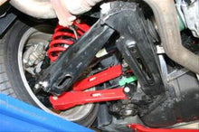 Load image into Gallery viewer, BMR TOE RODS REAR NON-ADJ POLY BUSHINGS - RED (10-15 CAMARO) - eliteracefab.com