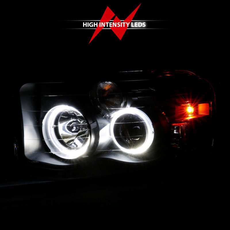 ANZO 2002-2005 Dodge Ram 1500 Projector Headlights w/ Halo Black Clear Amber - eliteracefab.com