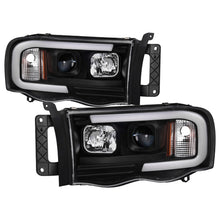 Load image into Gallery viewer, Spyder 02-05 Dodge Ram 1500 Light Bar Projector Headlights - Black (PRO-YD-DR02V2-LB-BK) - eliteracefab.com