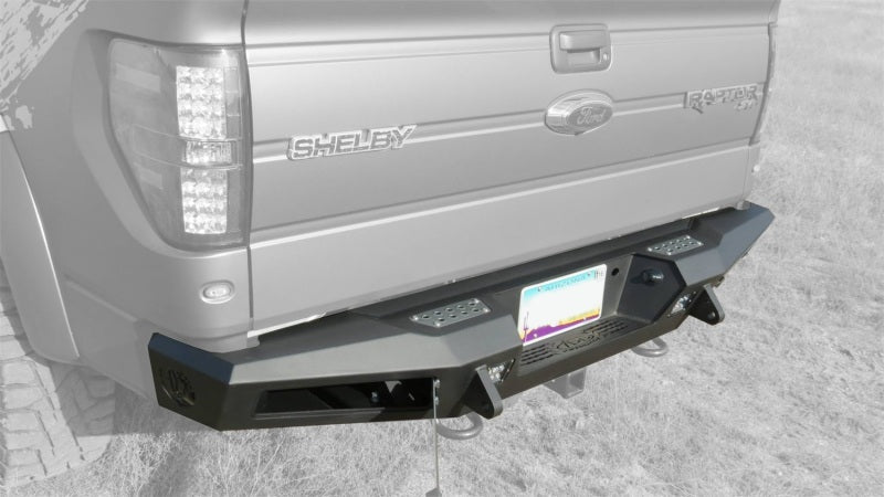 Addictive Desert Designs 10-14 Ford F-150 Raptor HoneyBadger Rear Bumper w/ Tow Hooks - eliteracefab.com