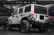 Load image into Gallery viewer, MagnaFlow 07-17 Jeep Wrangler JK 3.8/3.6L Dual Split Rear Exit Black Axle-Back Exhaust - eliteracefab.com