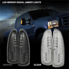 Load image into Gallery viewer, xTune Ford Superduty F250-F650 03-07 Amber LED Mirror Signal Lens - Clear ACC-LED-FDSD99-MR-C - eliteracefab.com