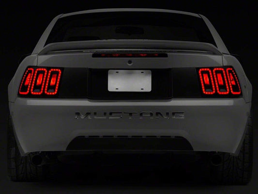 Raxiom 99-04 Ford Mustang Excluding 99-01 Cobra Icon LED Tail Lights- Black Housing (Smoked Lens) Raxiom