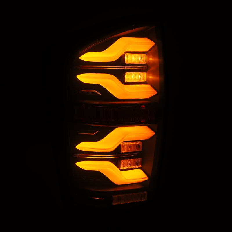 AlphaRex 16-21 Toyota TacomaLUXX LED Taillights Blk w/Activ Light/Seq Signal - eliteracefab.com