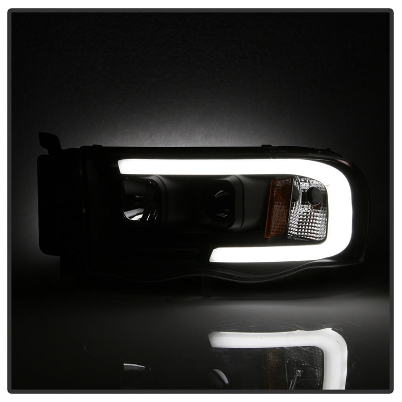 Spyder 02-05 Dodge Ram 1500 Light Bar Projector Headlights - Black (PRO-YD-DR02V2-LB-BK) - eliteracefab.com