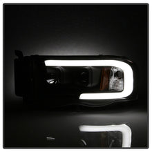 Load image into Gallery viewer, Spyder 02-05 Dodge Ram 1500 Light Bar Projector Headlights - Black (PRO-YD-DR02V2-LB-BK) - eliteracefab.com