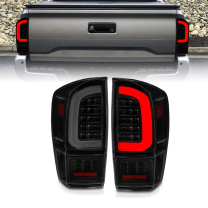 ANZO 16-21 Toyota Tacoma LED Tail Lights - w/ Light Bar Sequential Black Housing & Smoke Lens - eliteracefab.com