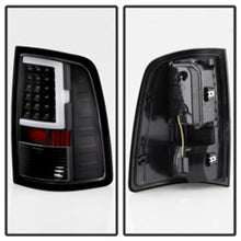 Load image into Gallery viewer, xTune 13-18 Dodge Ram 1500 LED Tail Lights - Black (ALT-ON-DRAM13V2-LBLED-BK) - eliteracefab.com