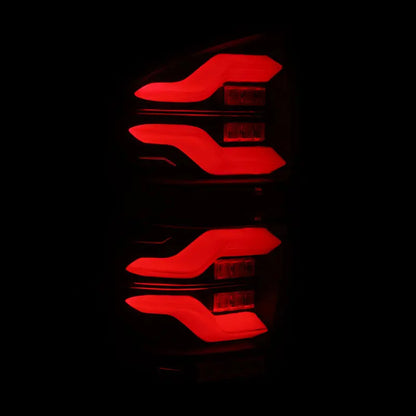 AlphaRex 16-21 Toyota Tacoma LUXX LED Taillights Alpha Blk w/Activ Light/Seq Signal - eliteracefab.com