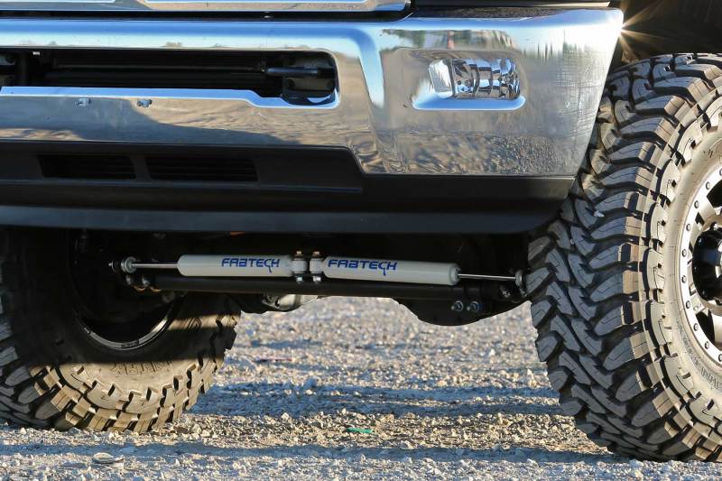 Fabtech 14-18 Ram 2500/3500 4WD Dual Steering Stabilizer System w/Perf. Shocks - eliteracefab.com