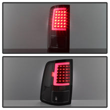 Load image into Gallery viewer, xTune 09-18 Dodge Ram 1500 LED Tail Lights - Black Smoke (ALT-ON-DR09-LBLED-BSM) - eliteracefab.com