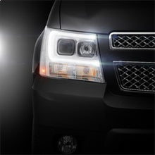 Load image into Gallery viewer, Spyder 07-14 Chevy Suburban/1500/2500/Tahoe V2 Projector Headlights Chrome PRO-YD-CSUB07V2-DRL-C - eliteracefab.com