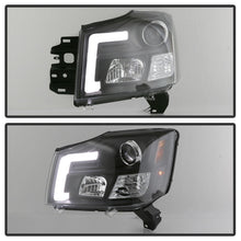 Load image into Gallery viewer, Spyder 04-15 Nissan Titan / 04-07 Nissan Armada V2 Projector Headlights - Black PRO-YD-NTI04-DRL-BK - eliteracefab.com