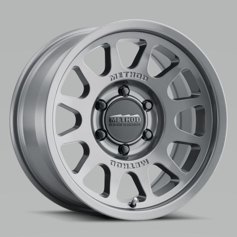 Method MR703 17x8.5 0mm Offset 6x5.5 106.25mm CB Gloss Titanium Wheel - eliteracefab.com