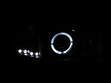 Load image into Gallery viewer, ANZO USA Dodge Ram Projector Headlights W/ Halo Black; 1994-2001 - eliteracefab.com