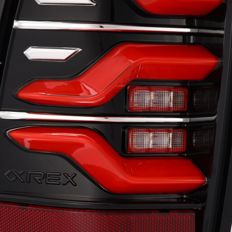 AlphaRex 05-15 Toyota Tacoma LUXX LED Taillights Blk/Red w/Activ Light/Seq Signal - eliteracefab.com