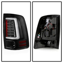 Load image into Gallery viewer, Spyder Dodge Ram 09-18 LED Tail Lights - All Black ALT-YD-DRAM09V2-LED-BKV2 (Incandescent Only) - eliteracefab.com