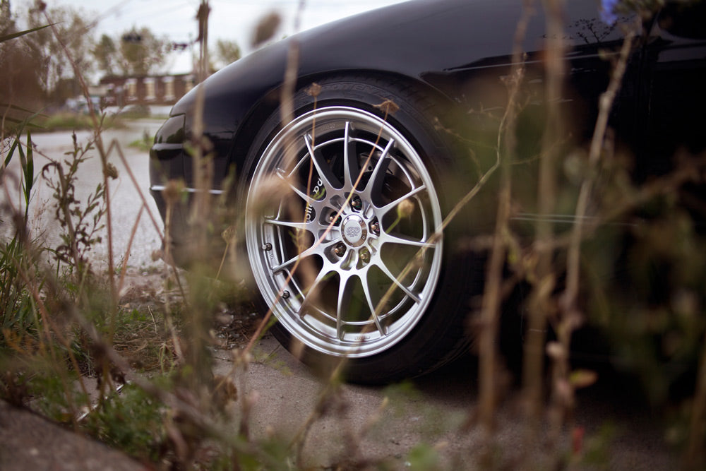 Enkei NT03+M 18x9.5 5x114.3 40mm Offset 72.6mm Bore Silver Wheel G35/350z - eliteracefab.com