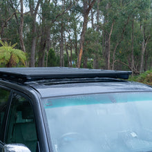 Load image into Gallery viewer, ARB Roof Rack Base with Mount Kit - Flat Rack with Wind Deflector - eliteracefab.com