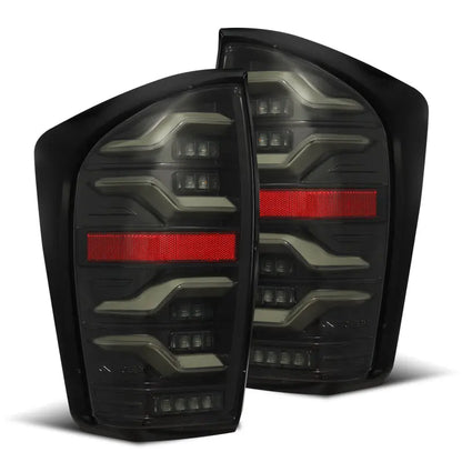 AlphaRex 16-21 Toyota Tacoma LUXX LED Taillights Alpha Blk w/Activ Light/Seq Signal - eliteracefab.com