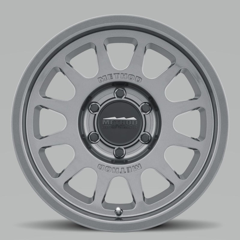 Method MR703 17x8.5 0mm Offset 6x5.5 106.25mm CB Gloss Titanium Wheel - eliteracefab.com