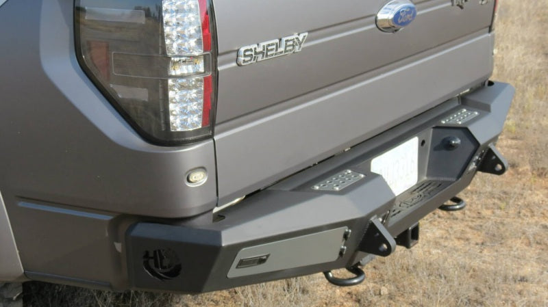 Addictive Desert Designs 10-14 Ford F-150 Raptor HoneyBadger Rear Bumper w/ Tow Hooks - eliteracefab.com