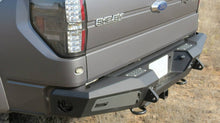 Load image into Gallery viewer, Addictive Desert Designs 10-14 Ford F-150 Raptor HoneyBadger Rear Bumper w/ Tow Hooks - eliteracefab.com