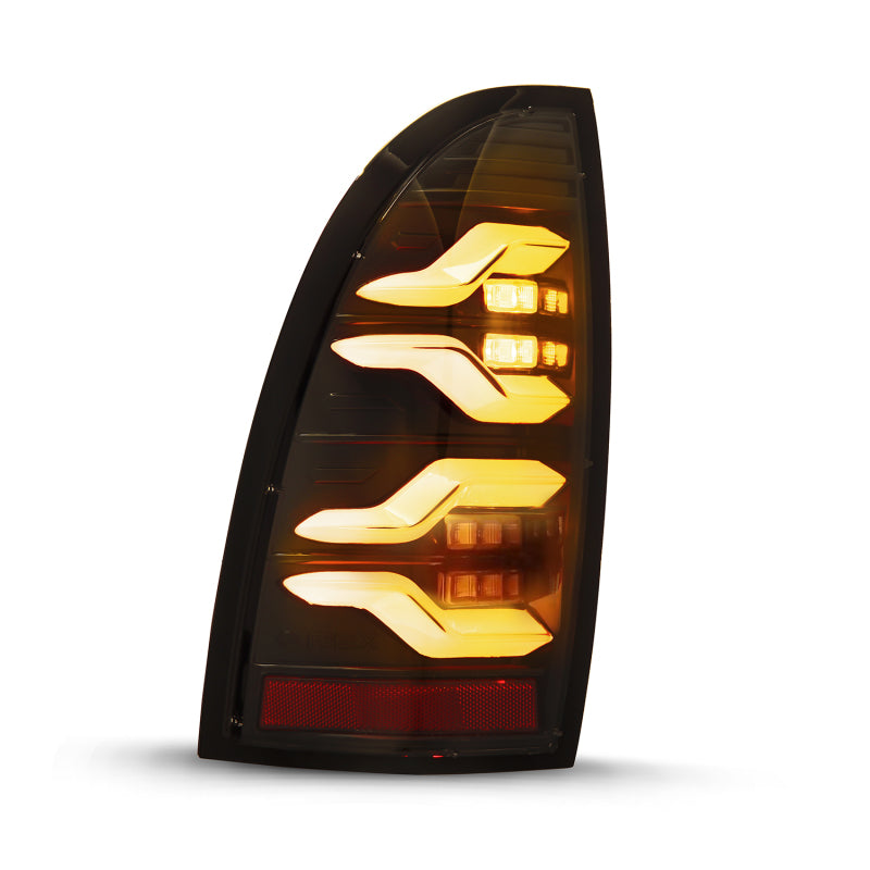 AlphaRex 05-15 Toyota Tacoma LUXX LED Taillights Alpha Blk w/Activ Light/Seq Signal - eliteracefab.com