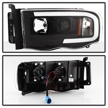 Load image into Gallery viewer, Spyder 02-05 Dodge Ram 1500 Light Bar Projector Headlights - Black (PRO-YD-DR02V2-LB-BK) - eliteracefab.com